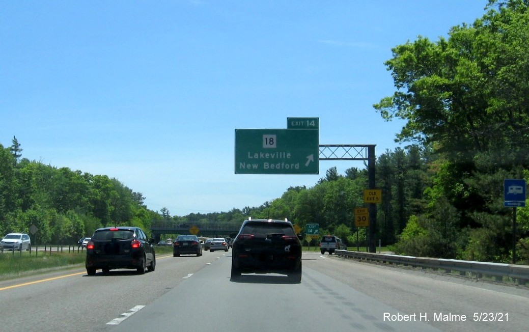 Image of overhead ramp sign for MA 18 exit with new milepost based exit number on I-495 South in Middleboro, May 2021