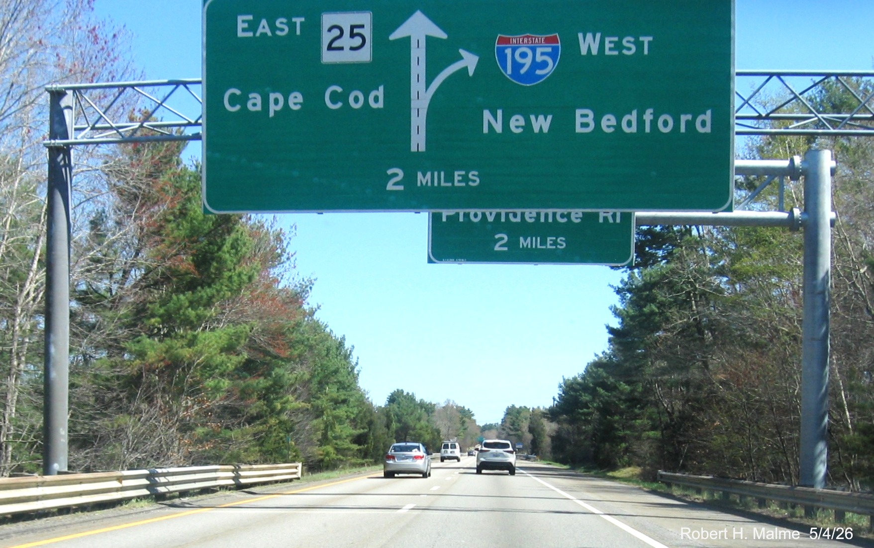 Image of new 2 miles advance cantilever sign for I-195 West/MA 25 East exit on I-495 South 
	in Wareham, Google Maps Street View, May 2026
