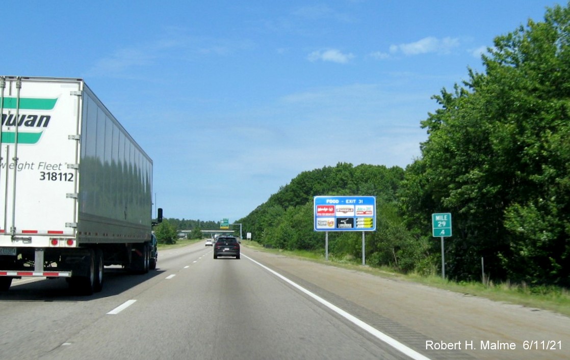 Image of auxiliary sign for MA 140 North exit with new milepost based exit number on I-495 North in Mansfield, June 2021