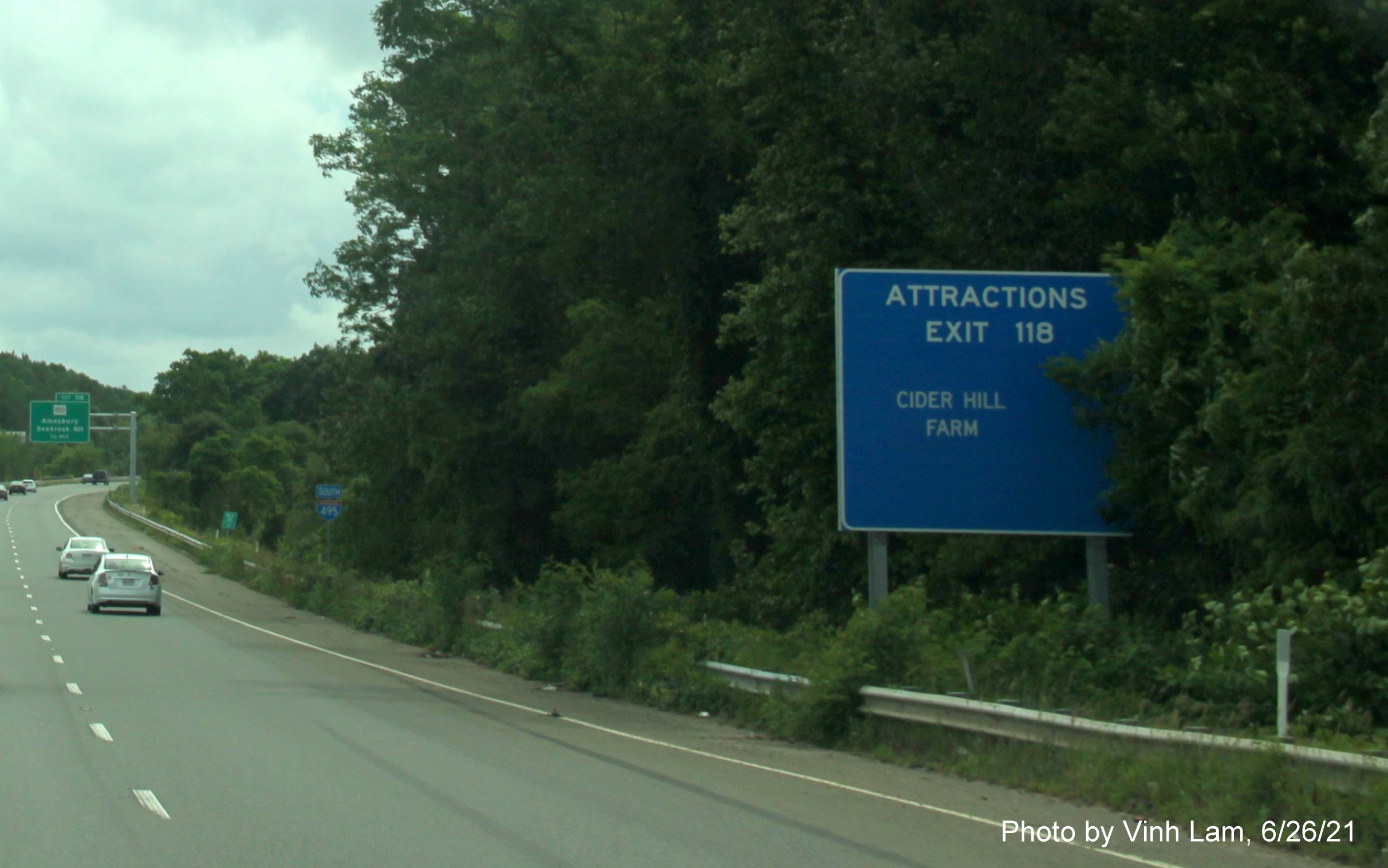 Image of auxiliary sign for MA 150 exit with new milepost based exit number on I-495 South in Amesbury, photo bt Vinh Lam, June 2021