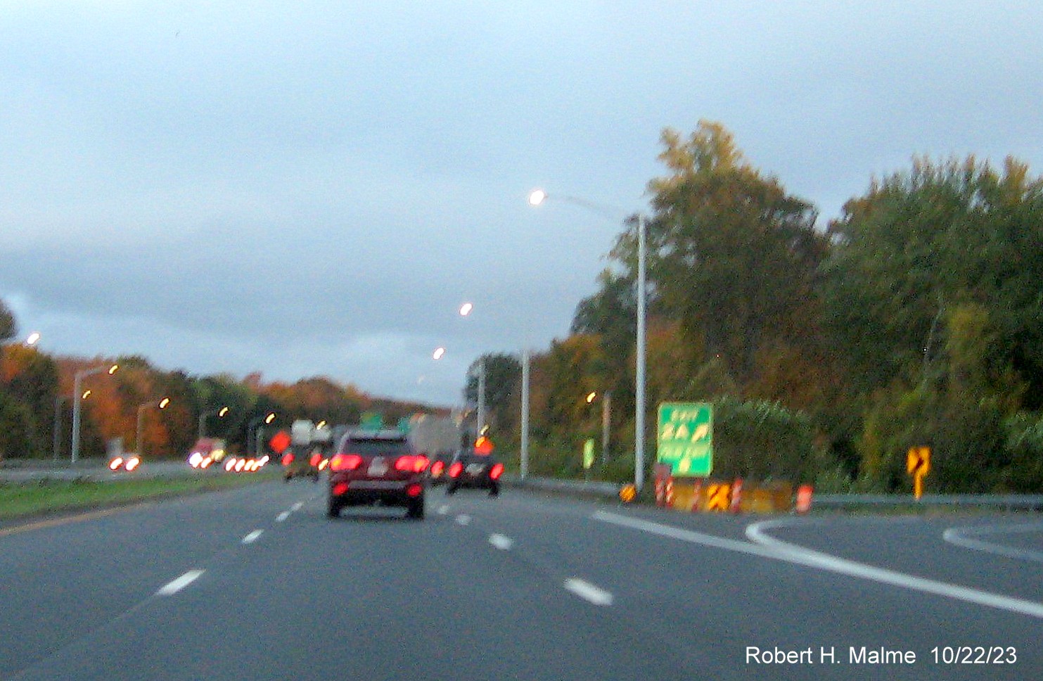 Image of new gore sign for the US 5 exit with the new milepost based exit number and Old Exit 8 sign below,
        October 2023