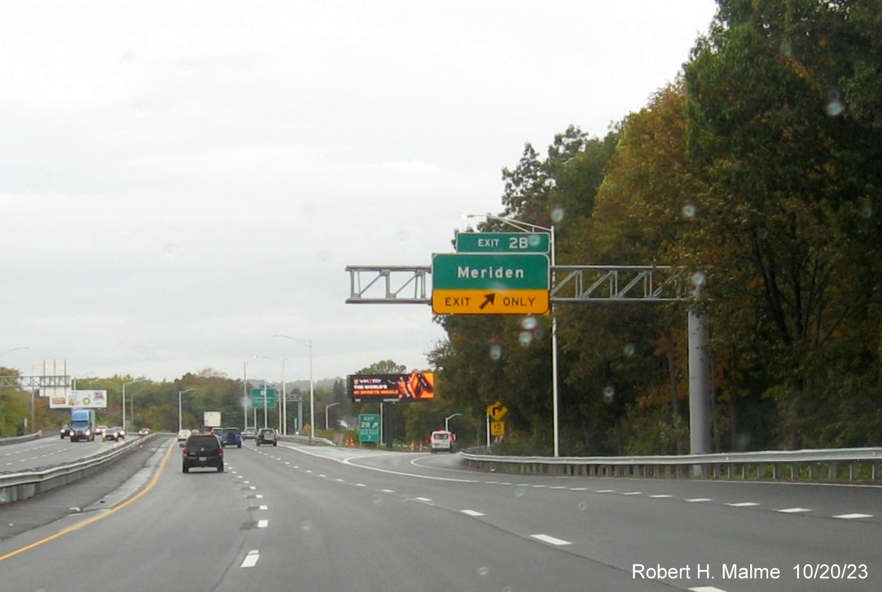 Image of new overhead ramp sign for the Meriden exit with new milepost based exit number 
         on I-691 West in Meriden, October 2023
