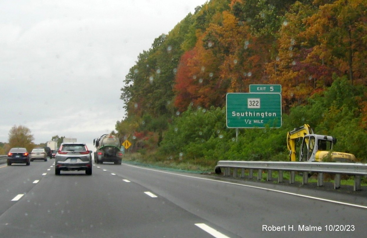 Image of new ground mounted 1/2 mile advance sign for the CT 322 exit with new milepost based exit number 
         on I-691 West in Southington, October 2023