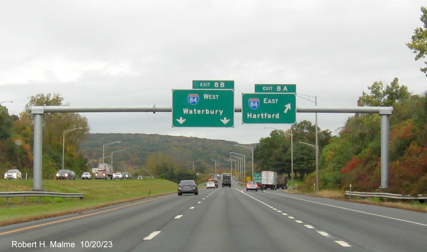 Image of new overhead signs at the CT 10 exit with new milepost based exit number 
         on I-691 West in cheshire, October 2023
