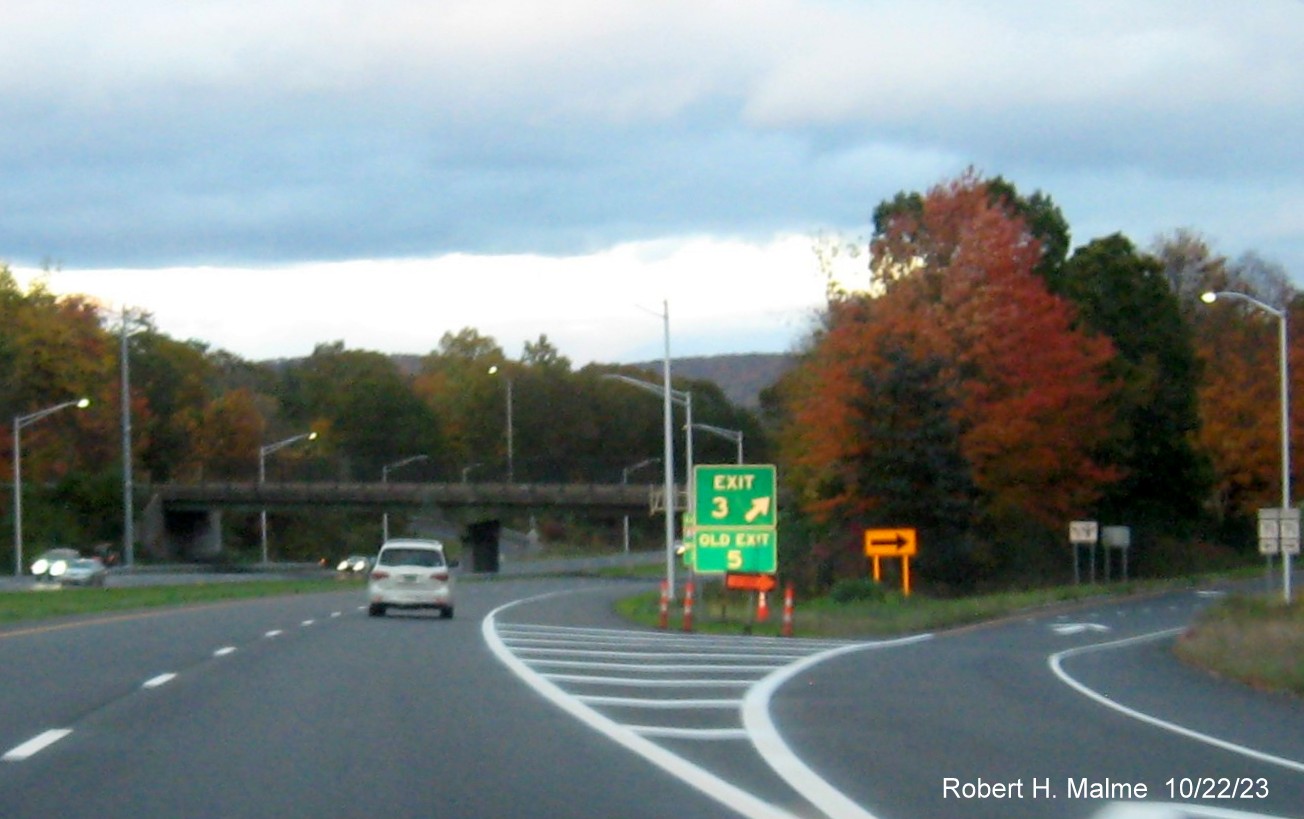 Image of new gore sign for the NC 71 exit with the new milepost based exit number and Old Exit 5 sign below
          , October 2023