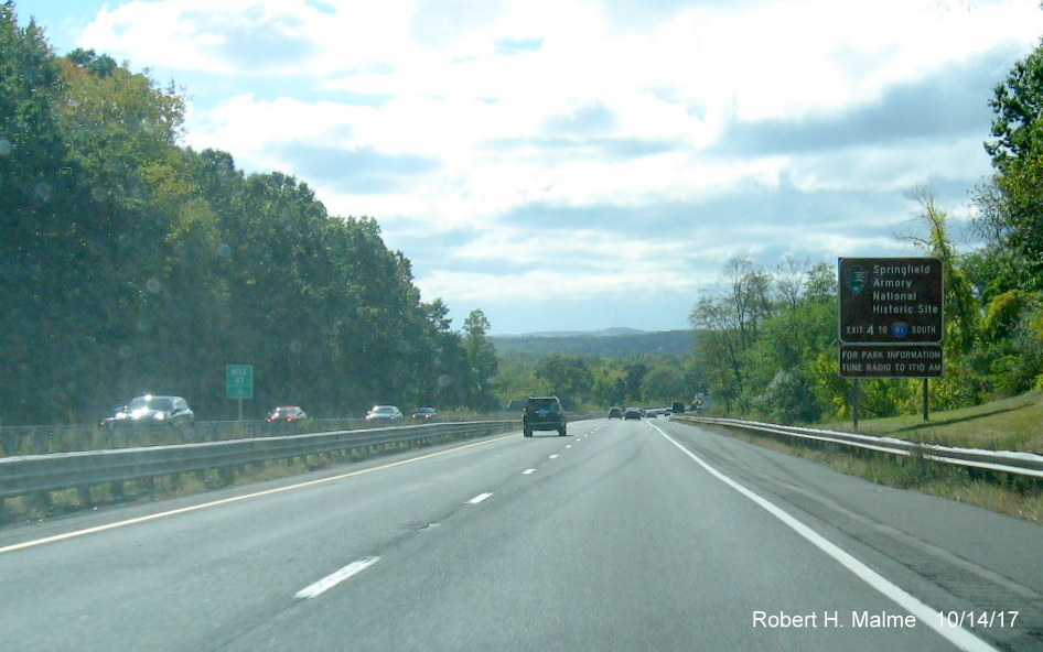 Image of newly placed brown auxiliary sign for Springfield attractions prior to I-91 exit on I-90/Mass Pike West in Chicopee