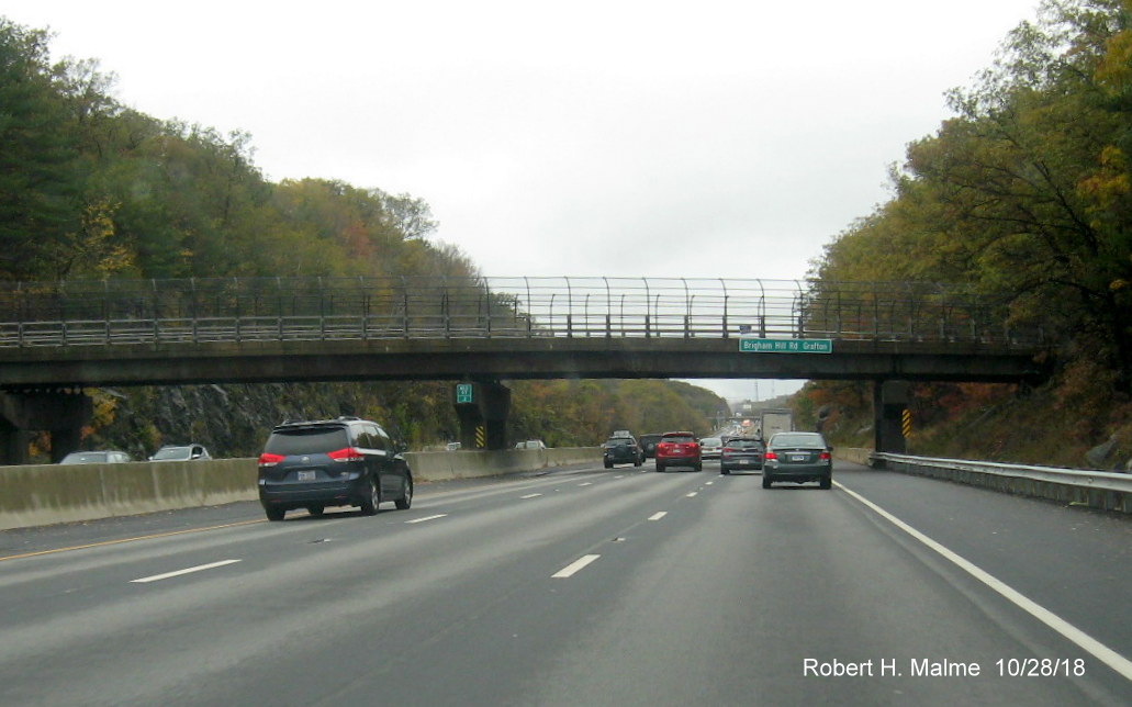 Image of recently placed new street and town name identifying sign on I-90/Mass Pike West in Grafton