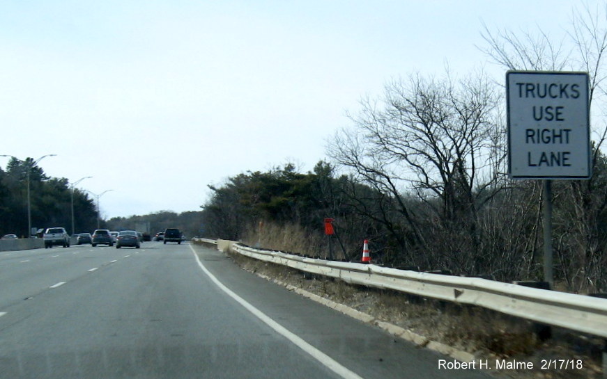 Image of contractor tag and overhead sign foundation on I-90/Mass Pike West for eastbound exit to I-95 in Weston