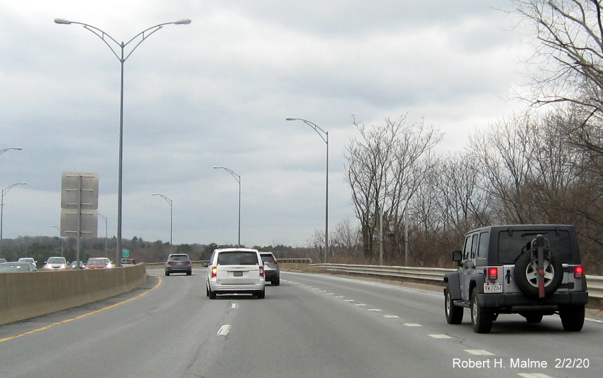 Sign support posts waiting for future Entering Weston sign on I-90/Mass Pike East in Newton