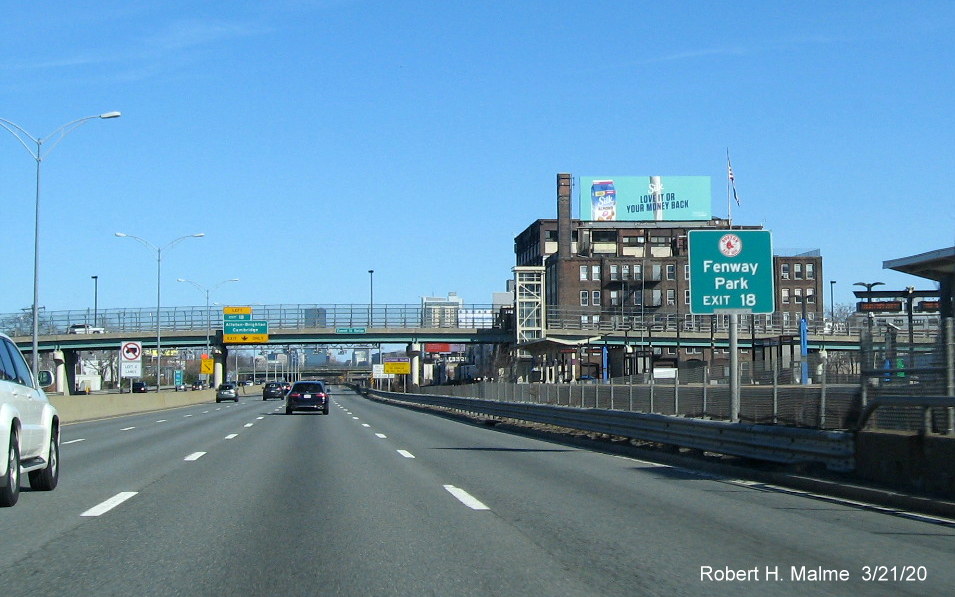 Image of Mass Guide/Paddle sign version of auxiliary sign for Allston/Brighton/Cambridge exit on I-90/Mass Pike East in Brighton