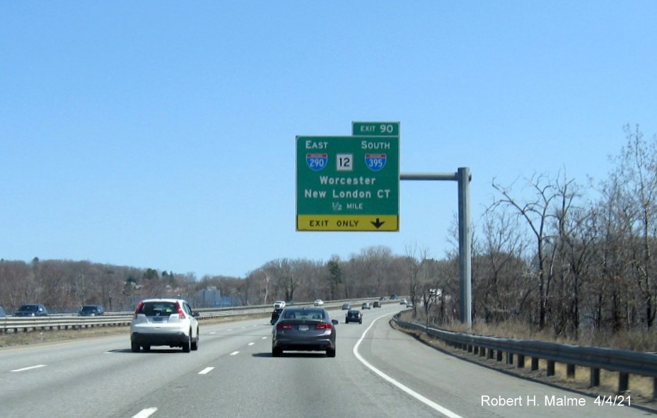 Image of 1/2 Mile advance overhead sign for I-290/I-395/MA 12 exit with new milepost based exit number 
                                             on I-90/Mass Pike East in Auburn, April 2021