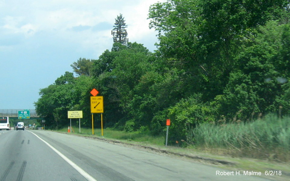 Image of contractor tag at site of future 1-mile advance sign for I-95 exit on I-90/Mass Pike East in Weston