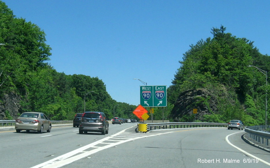 Image of signage for I-90 at ramp gore in former Auburn Toll Plaza in June 2019