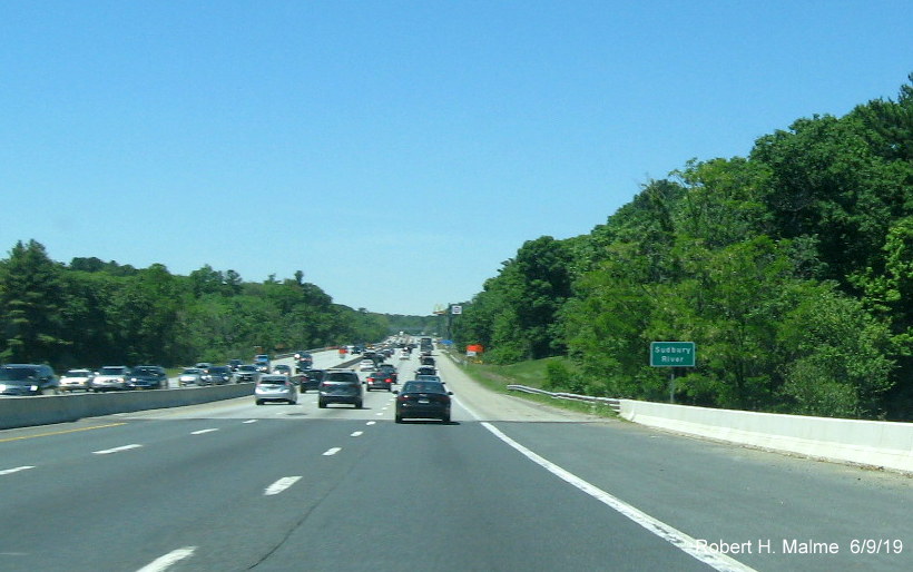 Image of recently placed ground-mounted sign marking bridge over Sudbury River on I-90/Mass Pike West in Framingham