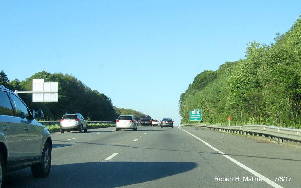 Image of contractor overhead sign support placement tag along I-90/Mass Pike East prior to MA 146 exit in Worcester