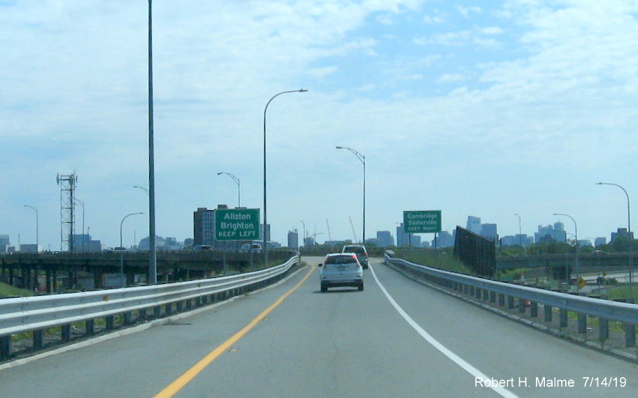 Image of new ground-mounted guide signage on ramp to Allston-Brighton/Cambridge from I-90/Mass Pike East in Boston