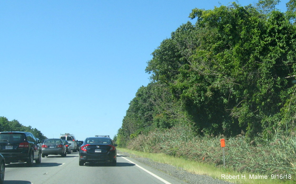 Image of contractor tag for future 1-Mile diagrammatic sign for I-95 exit on I-90/Mass Pike East on shoulder of I-90 West