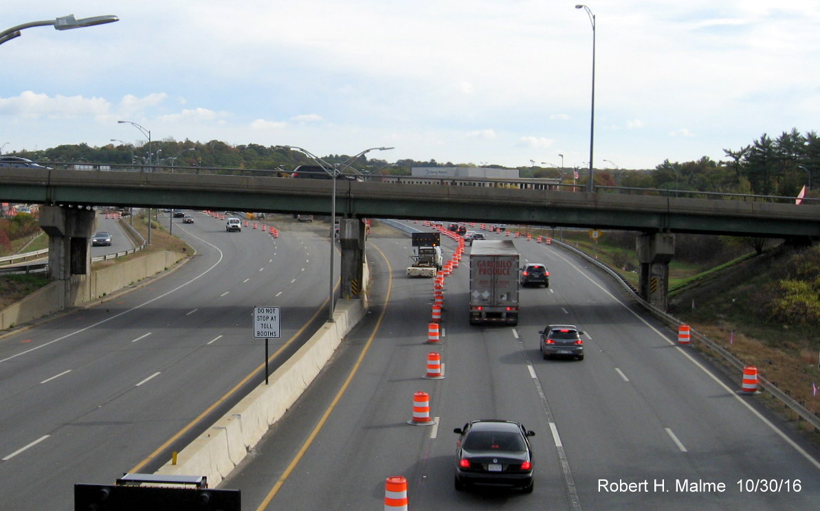 Image of traffic barrels funneling traffic through now closed Weston Tool Plaza on I-90 West after start of electronic tolling