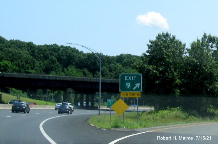 Image of gore sign for I-391 North exit with new milepost based exit number and yellow Old Exit 12 sign attached below on I-91 South in 
                                         West Springfield, July 2021