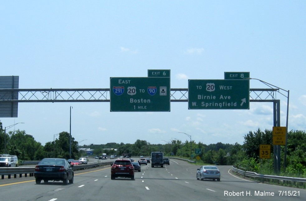 Image of overhead ramp sign for Birnie Avenue exit with new milepost based exit number on I-91 South 
                                         in West Springfield, July 2021