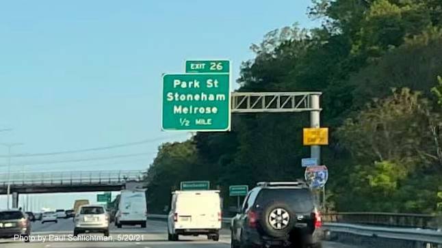 Image of 1/2 mile advance overhead sign for Park Street exit with new milepost based exit number and 
                                            yellow Old Exit 35 advisory sign on support on I-93 South in Woburn, by Paul Schlichtman, May 2021