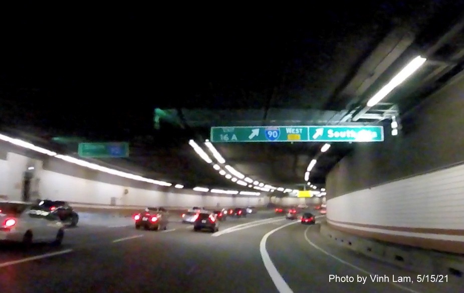 Image of overhead tunnel ceiling mounted ramp sign for I-90/South Station exit with new milepost based exit number on I-93 South in Boston, by Vinh Lam, May 2021 