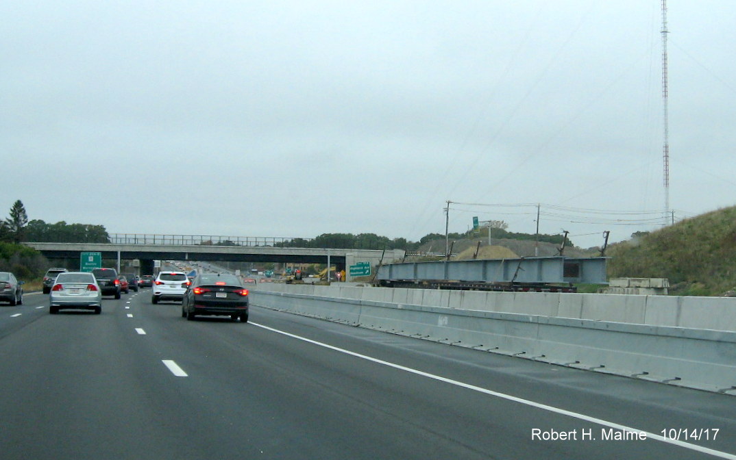 Image of bridge girder being stored in future C/D ramp to Highland Ave on I-95 North in Needham