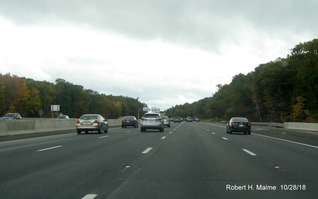 Image of open four lanes of traffic approaching Kendrick St on-ramp on I-95 South in completed Add-A-Lane Project work zone in Needham