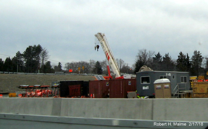 Image of closeup view of construction equipment stored at site of old Highland Ave bridge on I-95 South in Add-A-Lane Project work zone in Needham