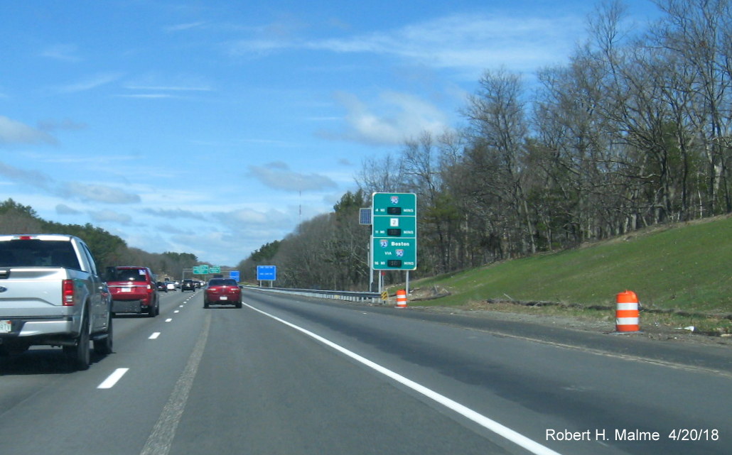Image of traffic along I-95/MA 128 North in Add-A-Lane Project work zone in Needham with temporary barriers removed from right shoulder prior to Kendrick St