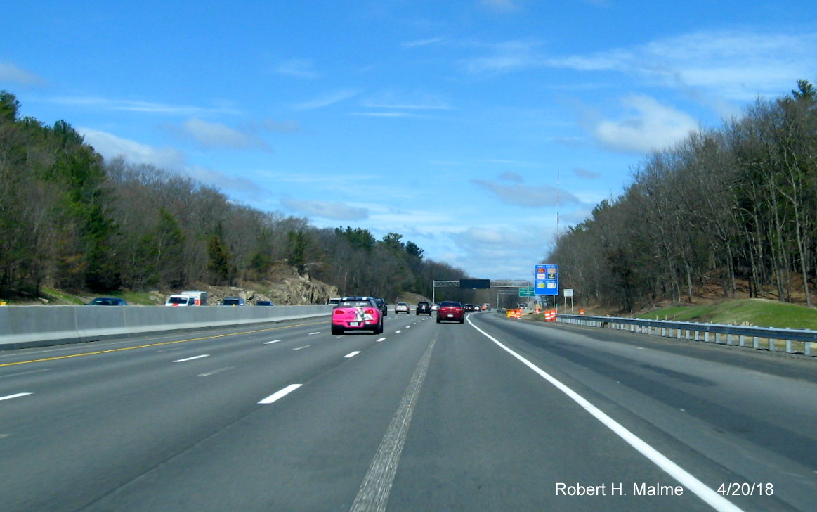 Image of new lane without temporary barriers blocking shoulder along I-95/MA 128 North approaching Kendrick St in Add-A-Lane Project work zone