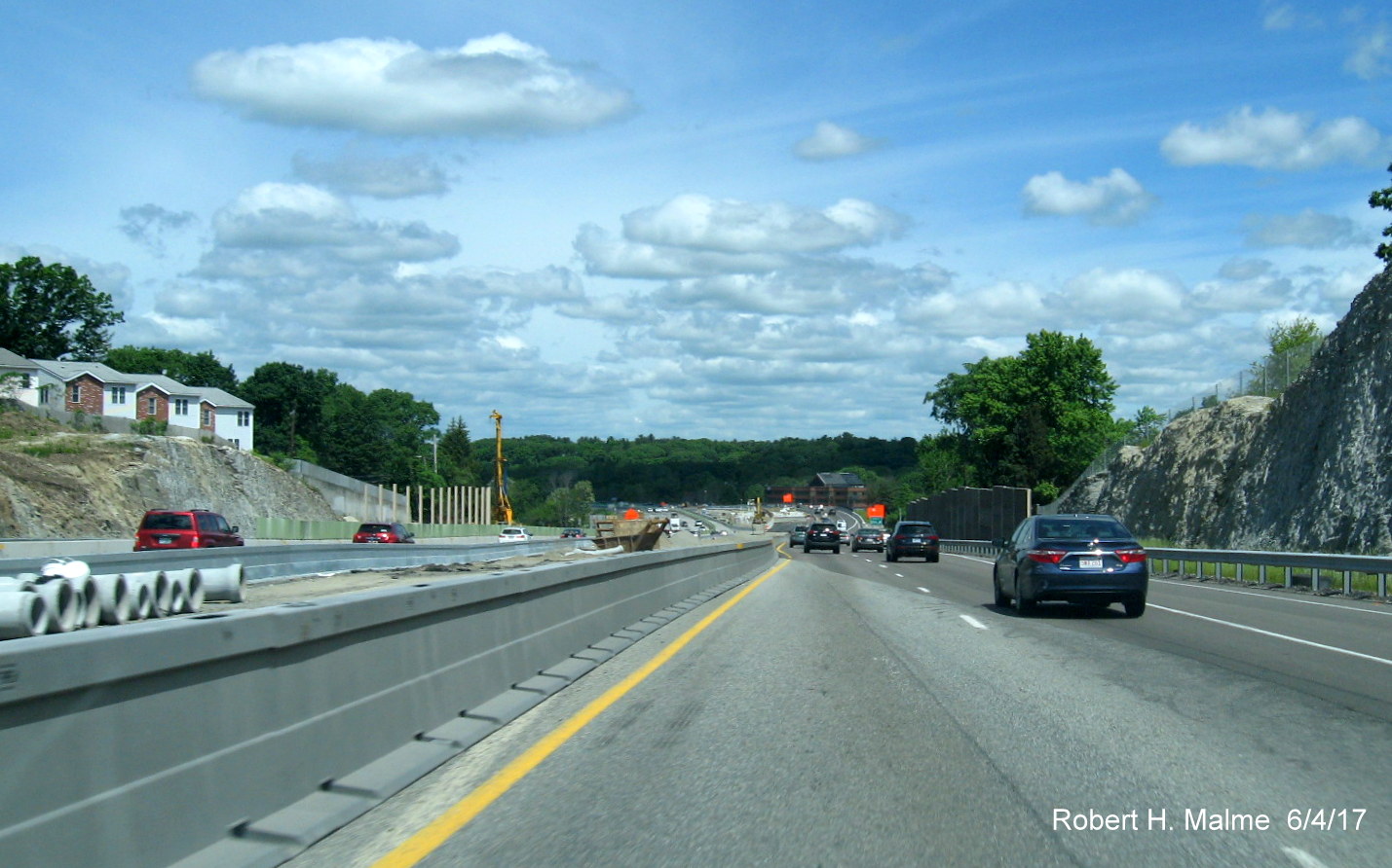 Image of construction under way in Add-A-Lane Project work zone approaching MA 9 exit on I-95 North in Needham