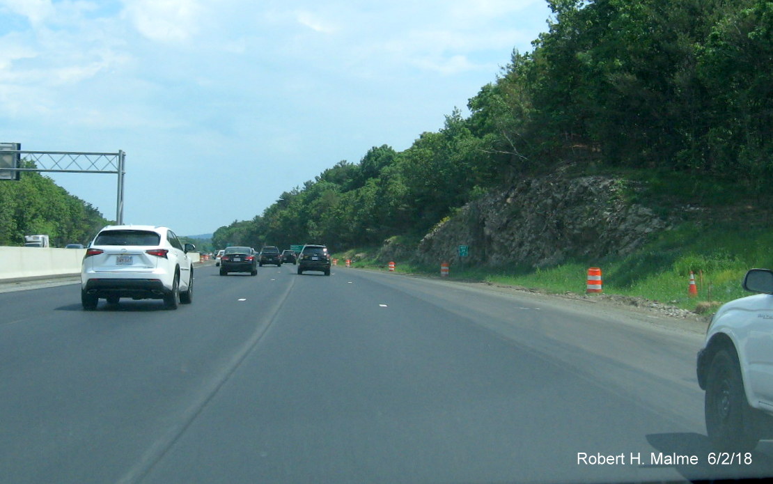 Image of pickup truck using future right hand paved lane on I-95 North in Add-A-Lane Project work zone in Needham