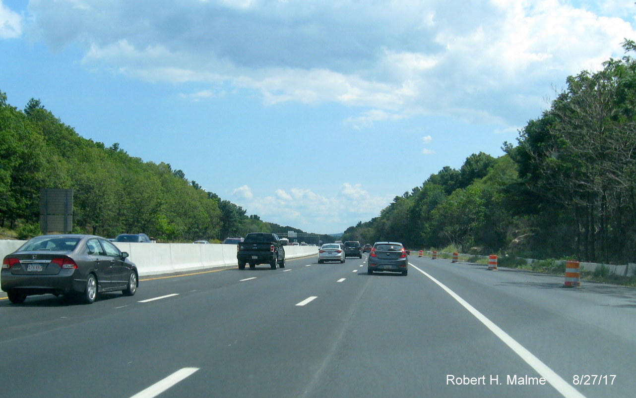 Image of final paving complete for additional lane of I-95 South in Add-A-Lane Project work zone south of Kendrick St in Needham