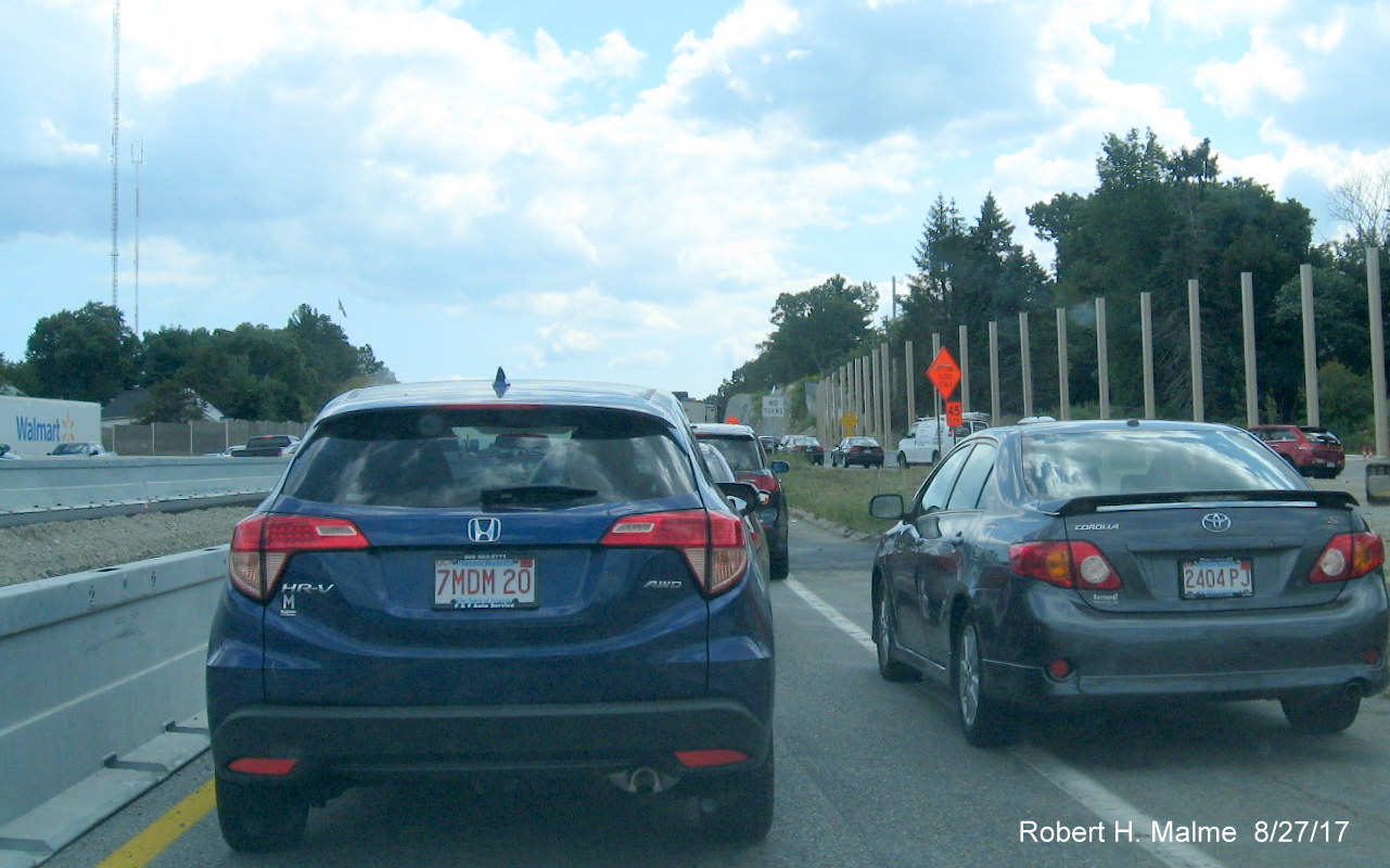 Image of car trying to sneak back into I-95 South lanes at MA 9 interchange in Add-A-Lane Project work zone in Wellesley