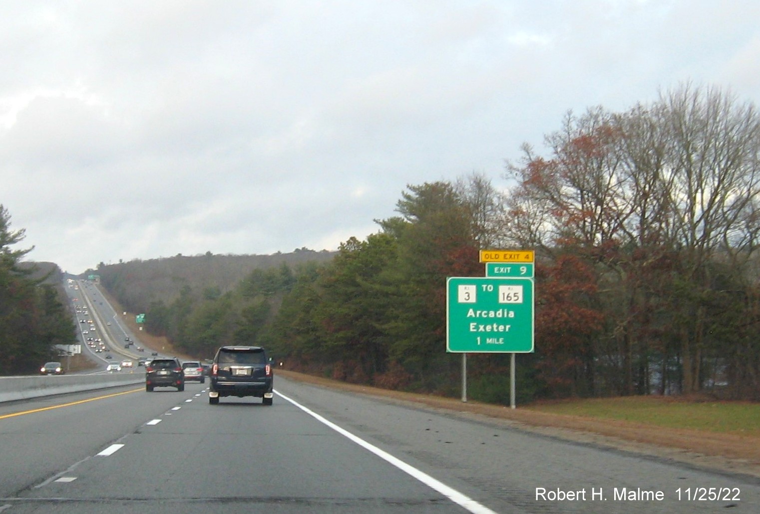 Image of ground mounted 1 mile advance sign for RI 3 to RI 165 exit with new milepost based exit number on I-95 North in Arcadia, November 2022