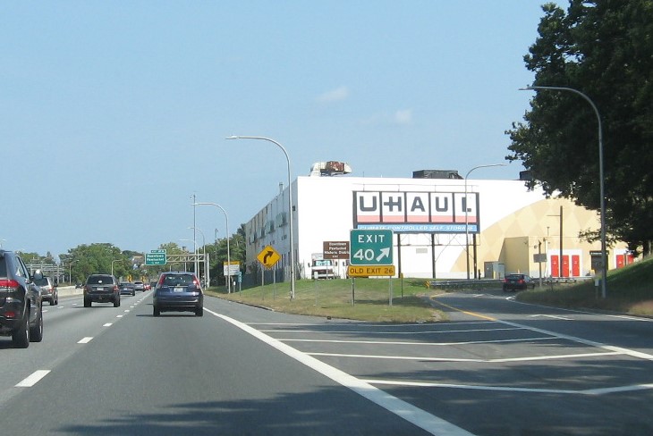 Bridge mounted 1 mile advance for US 1 RI 126 exits with new milepost based exit numbers on I-95 South in Pawtucket, September 2022