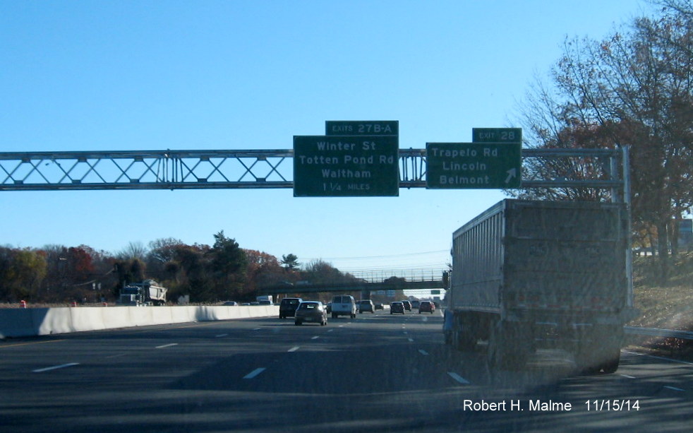 Image of new overhead exit signs for Trapelo Road and Totten Pond Rd on I-95 South in 
  Lincoln