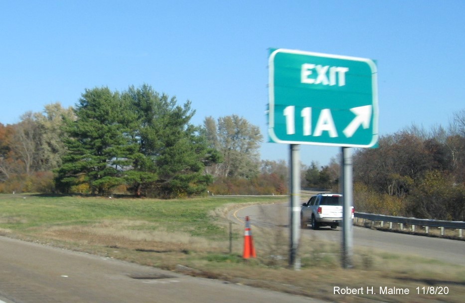 Image of newly placed foundation for future gore sign at ramp to Neponset Street east on I-95 North in Canton, November 2020