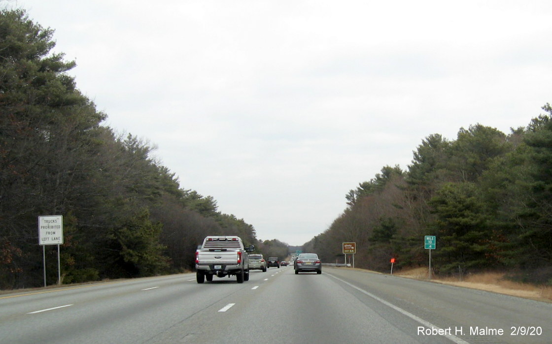 Image of orange contractor tag marking future location of 1-Mile advance overhead sign for I-495 exit on I-95 North in Mansfield