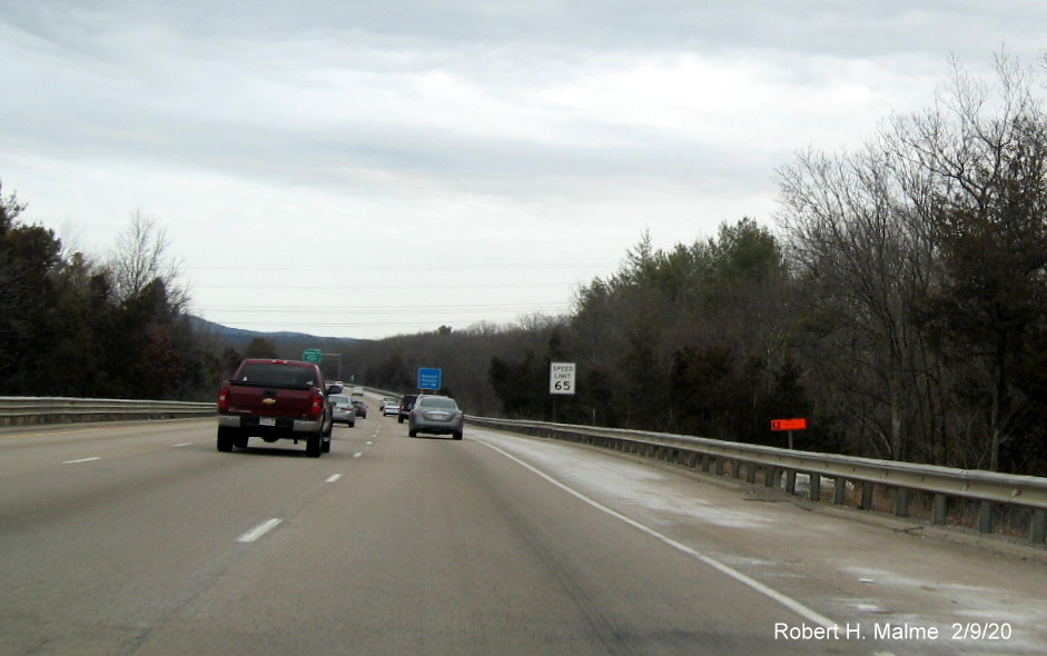 Image of wide orange contractor tag marking future location of traffic camera on I-95 North in Sharon