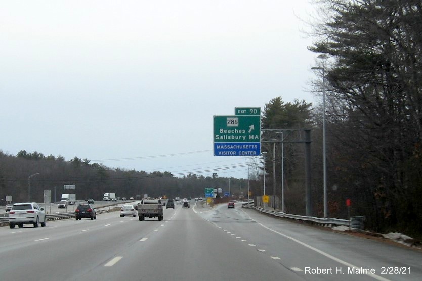 Image of overhead ramp sign for the MA 286 exit with new milepost based exit numbers on I-95 South in 
                                         Seabrook, NH, February 2021
