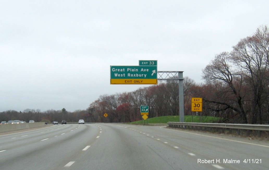 Image of overhead ramp sign for Great Plain Avenue exit with new milepost based exit number on I-95/MA
                                           128 North in Dedham, April 2021