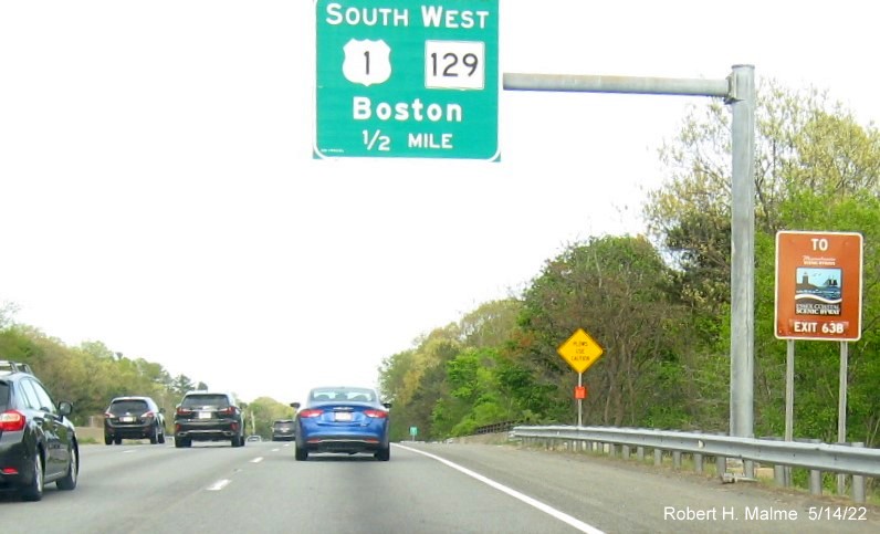 Image of contractor future sign placement tag and concrete foundation for new US 1 South/MA 129 West exit sign on I-95/MA 128 North in Lynnfield, May 2022
