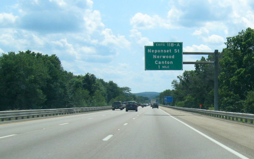 Image of contractor tag marking site of future 1-mile advance sign for Neponset Street exits on I-95 South in Westwood