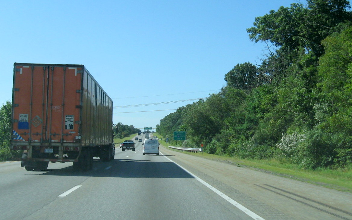 Image of orange contractor tag marking future site of 1/2 mile advance overhead sign for To MA 152 exit on I-95 South in North Attleboro