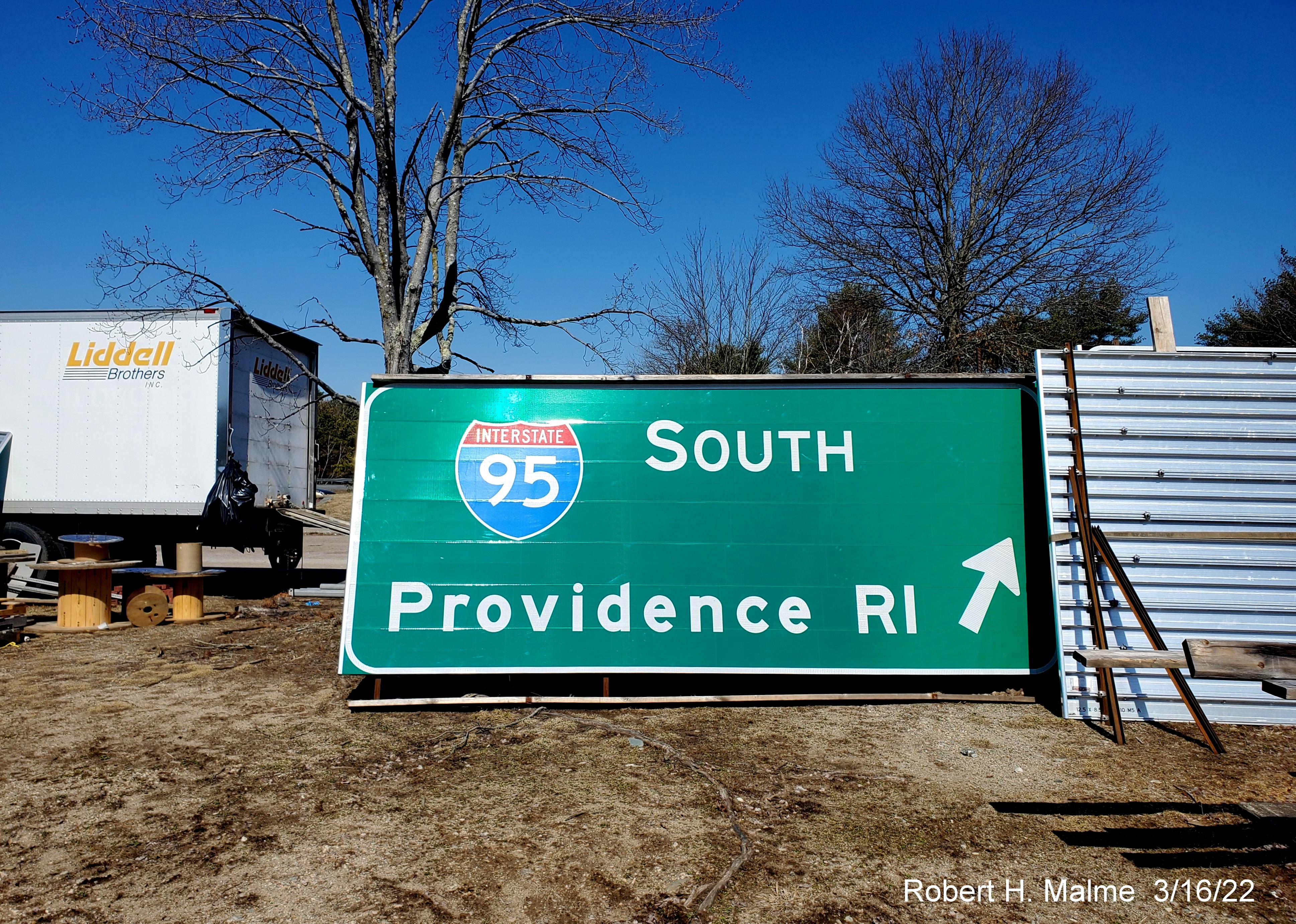 Image of a ground mounted ramp entrance sign for I-95 South awaiting placement at Mansfield Rest Area, March 2022