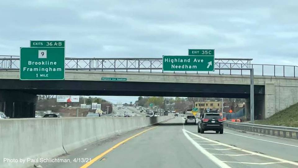 Image of 1 mile advance overhead sign for MA 9 exits with new milepost based exit numbers as seen 
                                             from Highland Ave C/D lanes from I-95/MA 128 North in Needham, by Paul Schlichtman, April 2021