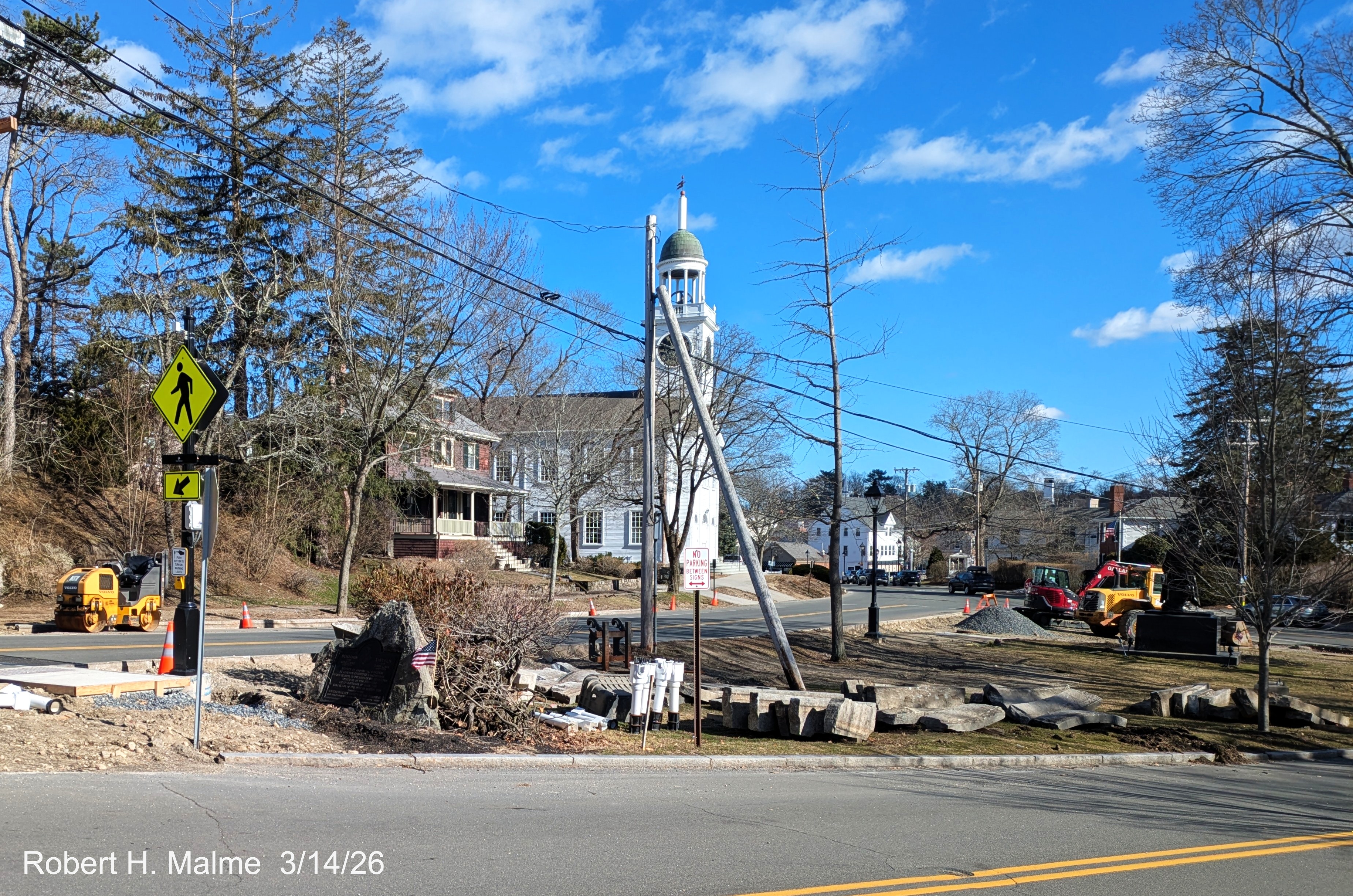 Image of future curbing being stored in Fountain Square looking southwest from in front
	of the Benjamin Lincoln House, March 2026
