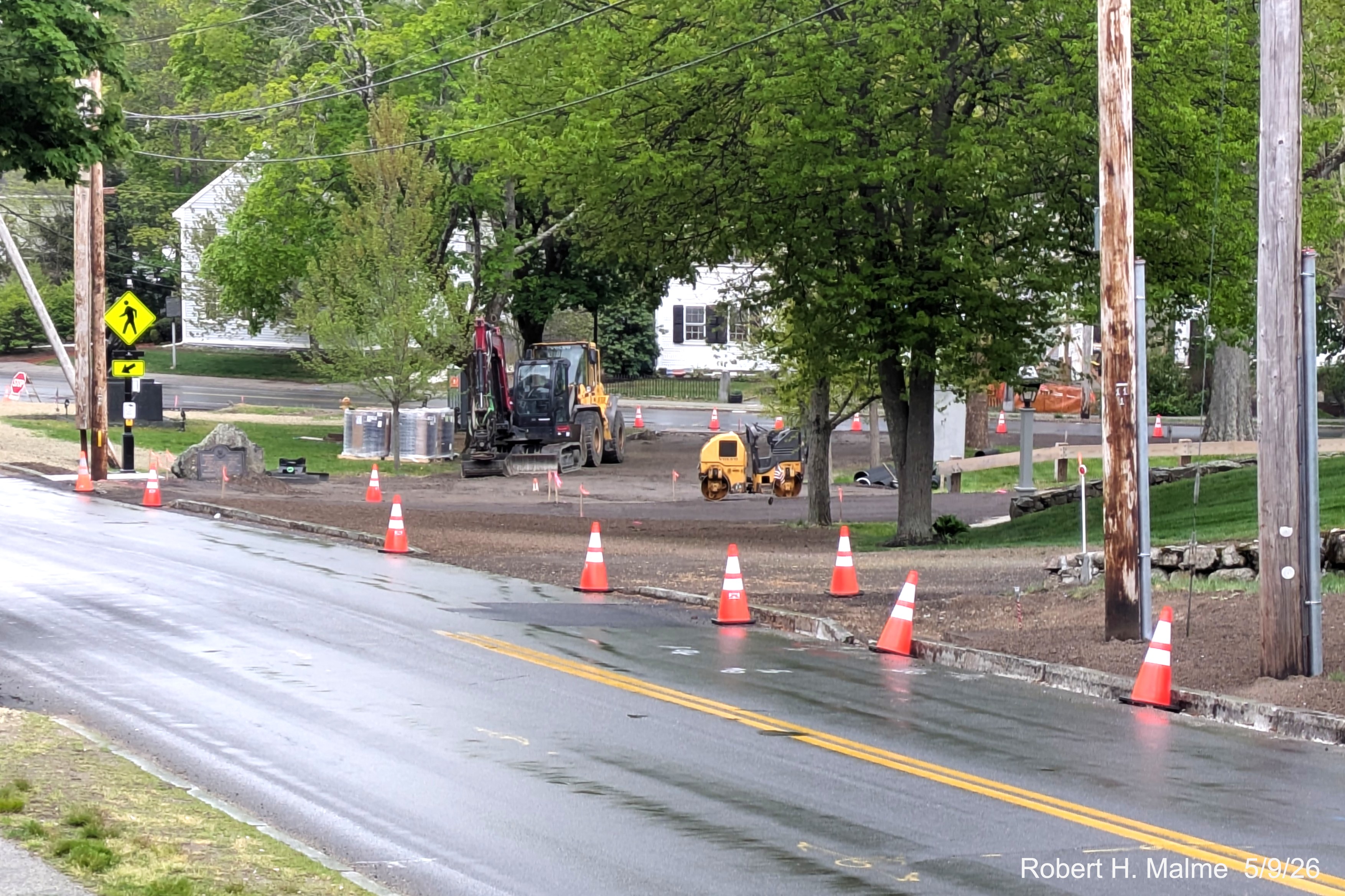 Image looking south on Lincoln Street towards the dirt piles near the intersection with
	North Street, May 2026